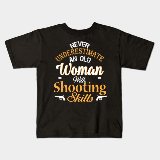 never underestimate an old woman with shooting skills Kids T-Shirt by fioruna25